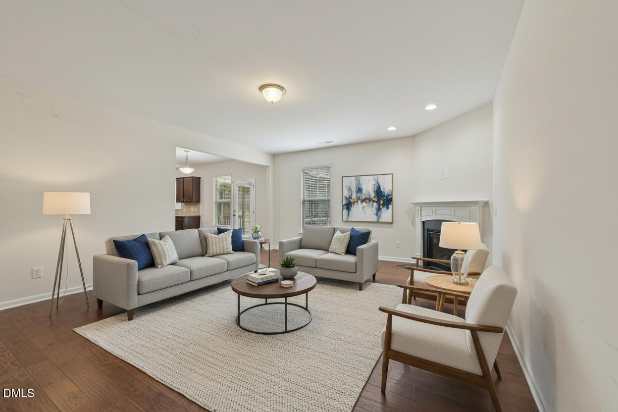 1024 Laredo Lane Durham, NC 27703 - Photo 5 of 32 a living room with furniture and a lamp