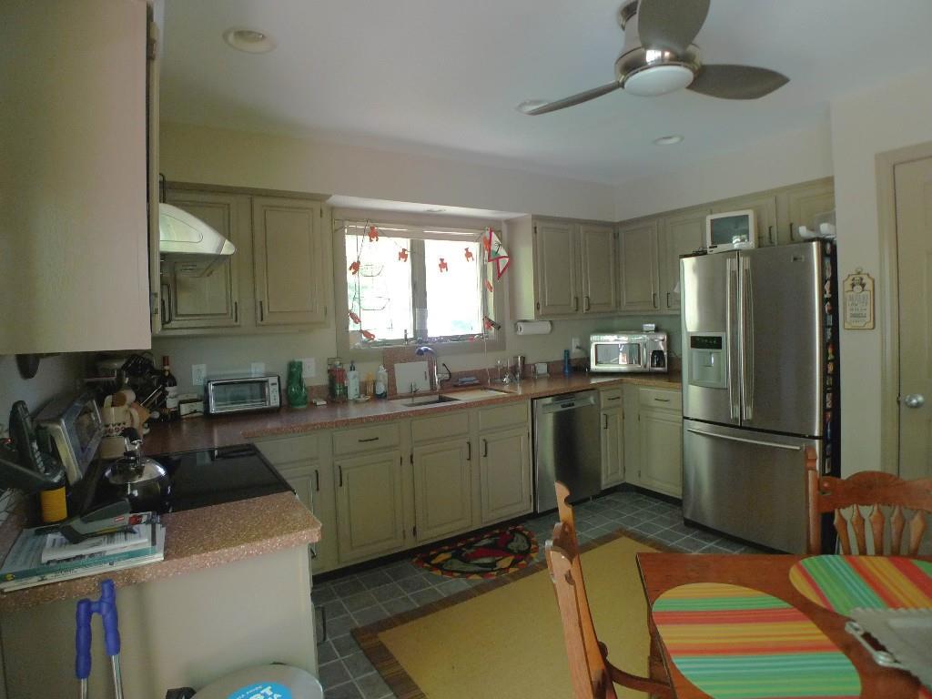 11 West Harbor Pond Road, Unit 11 Boothbay Harbor, ME 04575 - Photo 3 of 29 Updated kitchen with eat-in area.