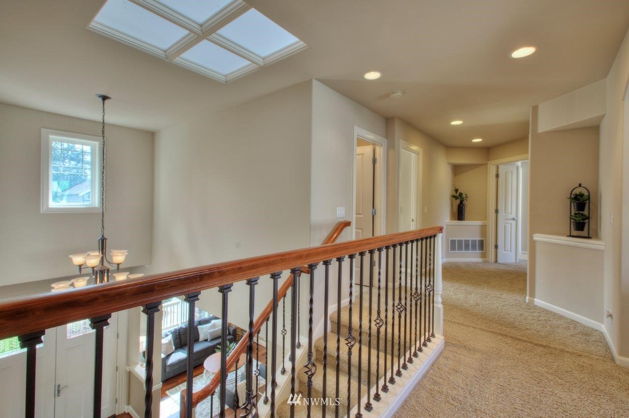 123 Ilwaco Place Southeast Renton, WA 98059 - Photo 18 of 33 a view of hallway with bedroom