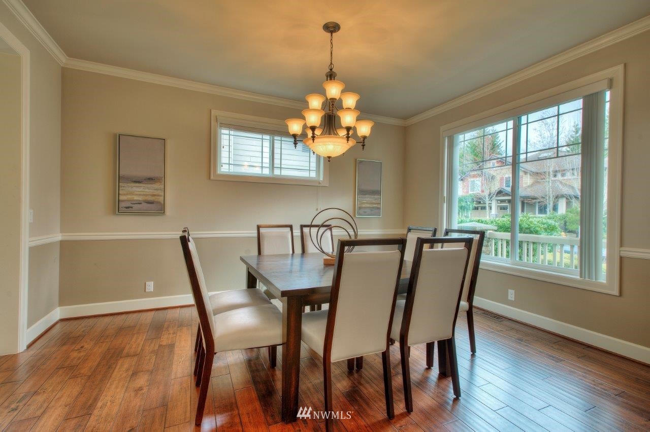 123 Ilwaco Place Southeast Renton, WA 98059 - Photo 6 of 33 a view of a dining room with furniture window and outside view