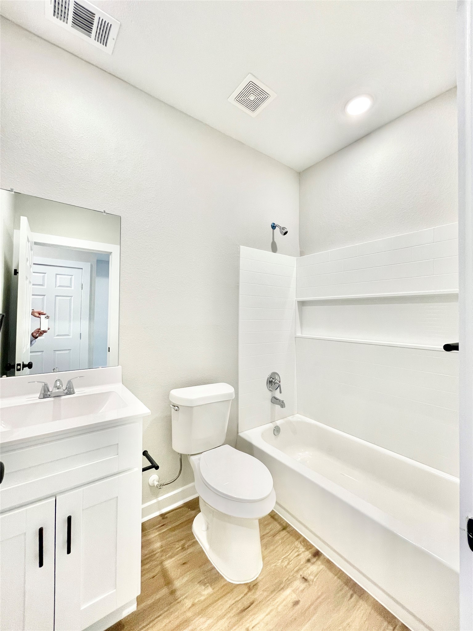 10317 Lake Road, Unit 4A Houston, TX 77070 - Photo 14 of 14 a bathroom with a sink toilet and shower