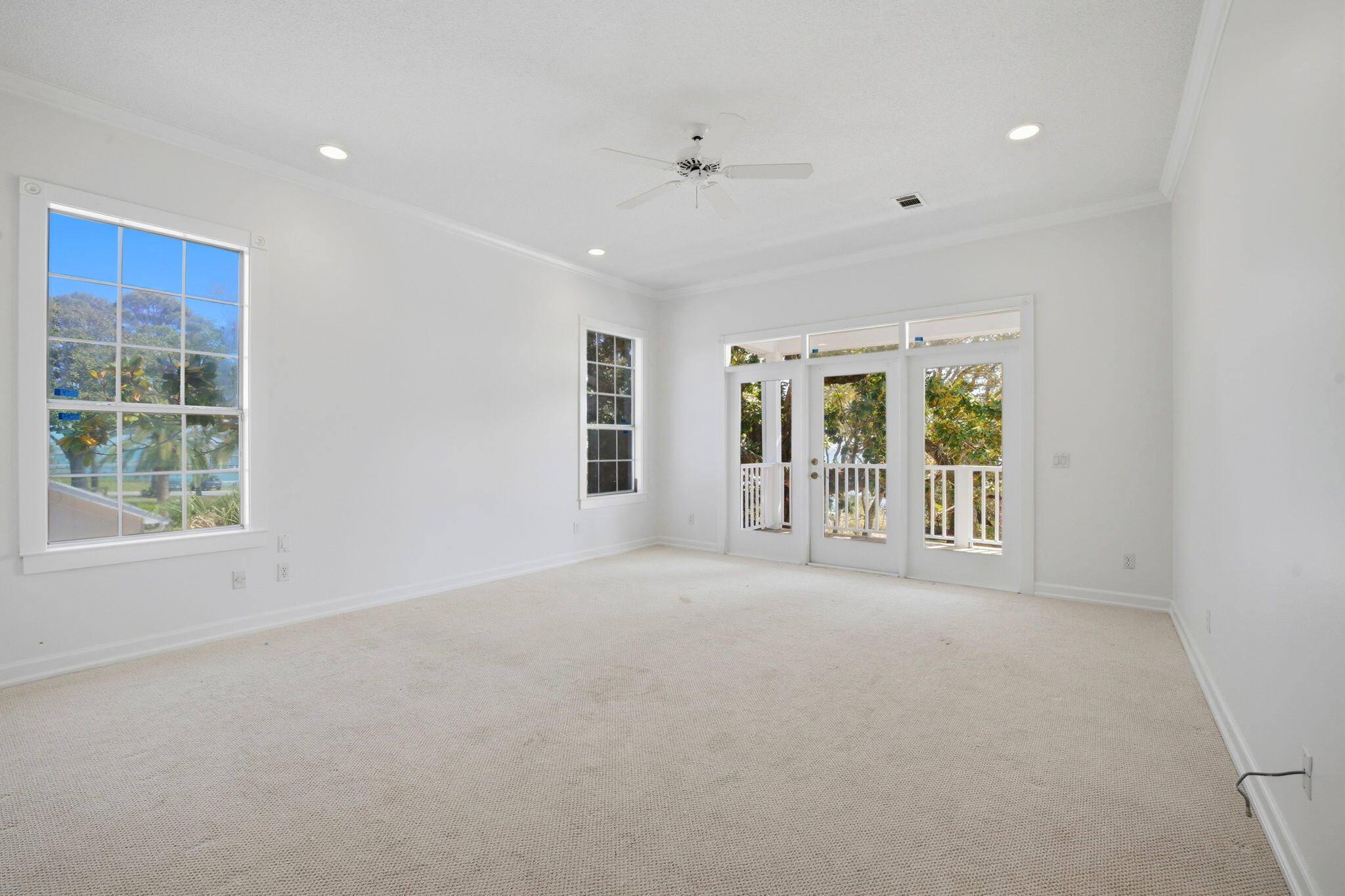 8127 Pompano Street Navarre, FL 32566 - Photo 15 of 44 a view of an empty room with a window