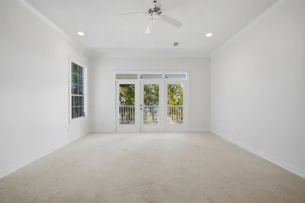 an empty room with windows and view