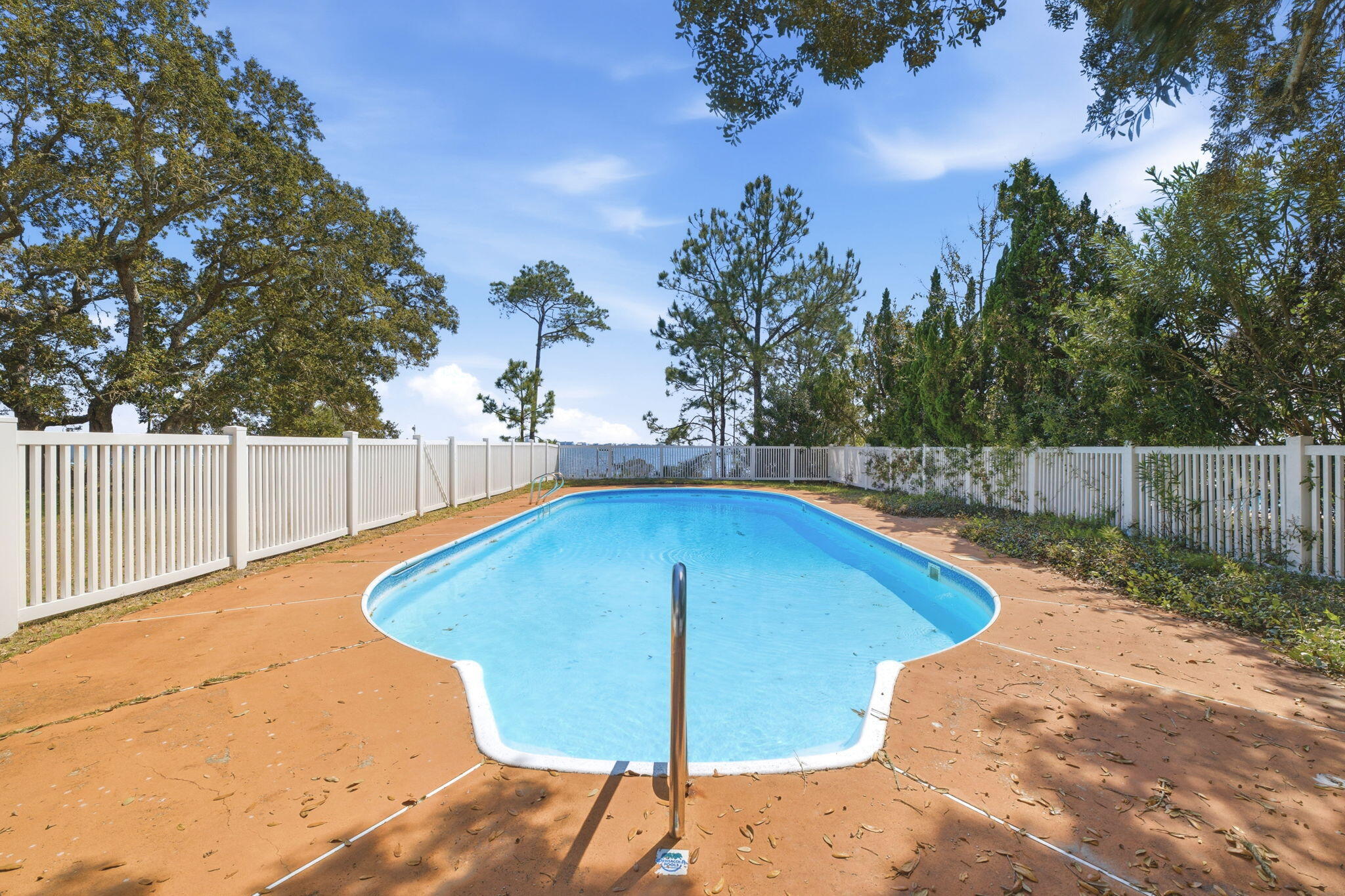 8127 Pompano Street Navarre, FL 32566 - Photo 30 of 44 a view of a backyard