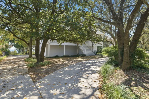a view of a house with a tree