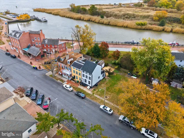 an aerial view of a house with outdoor space