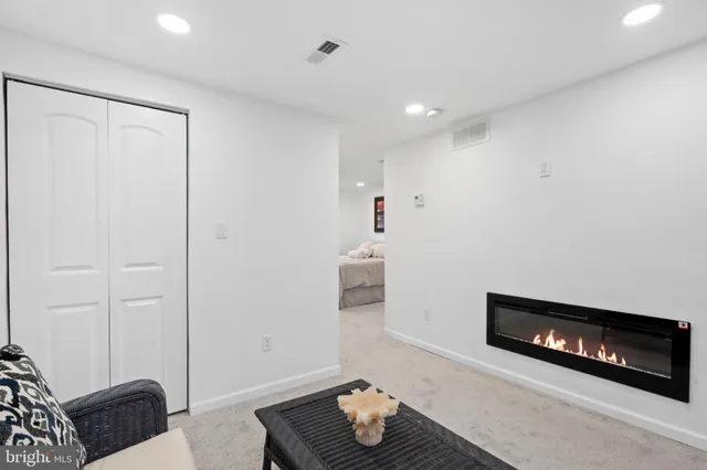 a living room with furniture and a couch