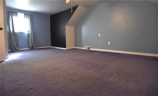 a bathroom with a toilet and a sink