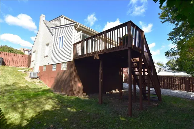 a view of a balcony with chairs