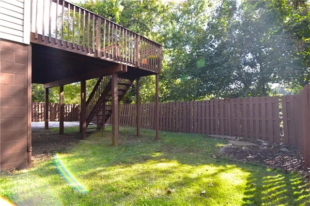 a view of deck with wooden floor and seating space
