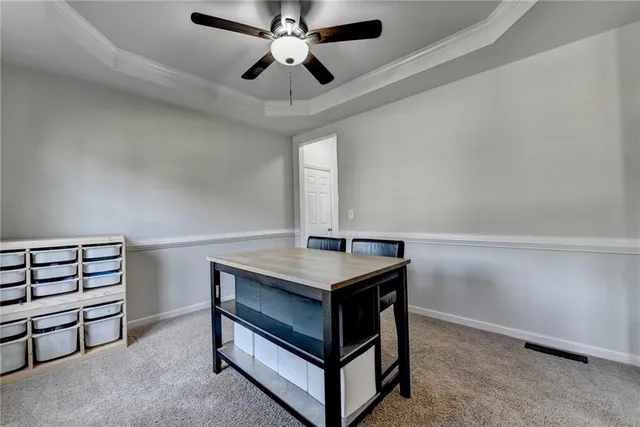 a kitchen with granite countertop cabinets stainless steel appliances a sink and a window