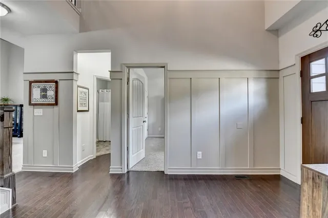 a living room with furniture fireplace and flat screen tv