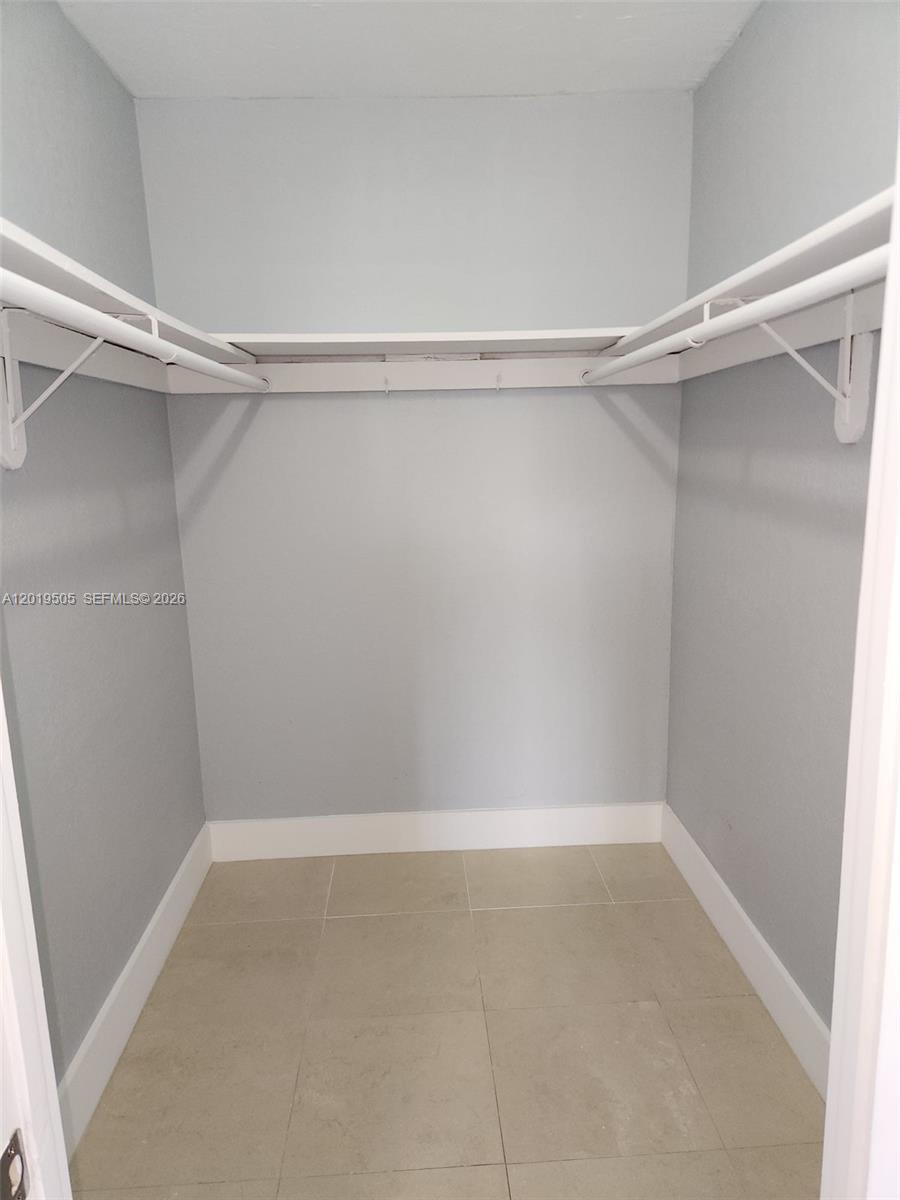 2811 North Pine Island Road, Unit 107 Sunrise, FL 33322 - Photo 13 of 16 a view of an empty room