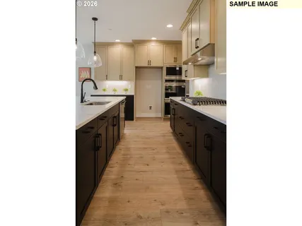 a view of a kitchen with a sink