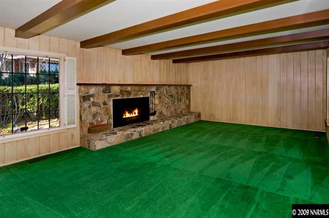 2365 Tuttle Circle Reno, NV 89509 - Photo 5 of 9 a living room with a fireplace and a window