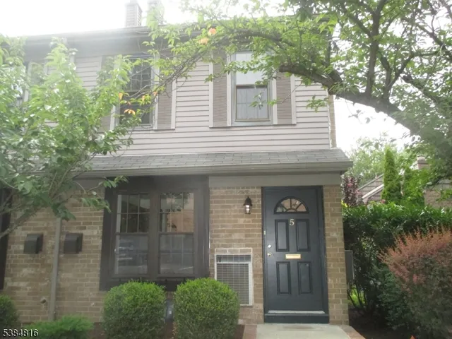 a front view of a house with entrance