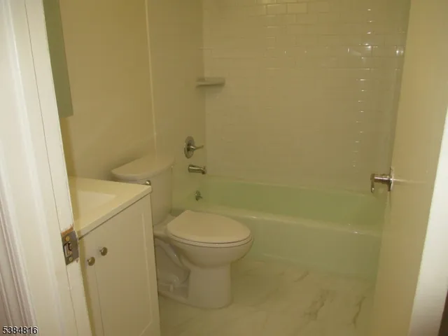 a bathroom with a sink and toilet