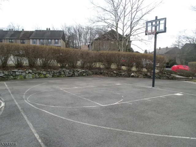 a view of a street with a building in the background