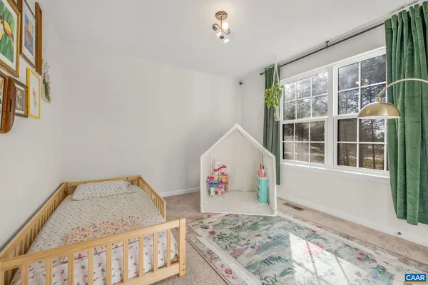 a view of bedroom with window
