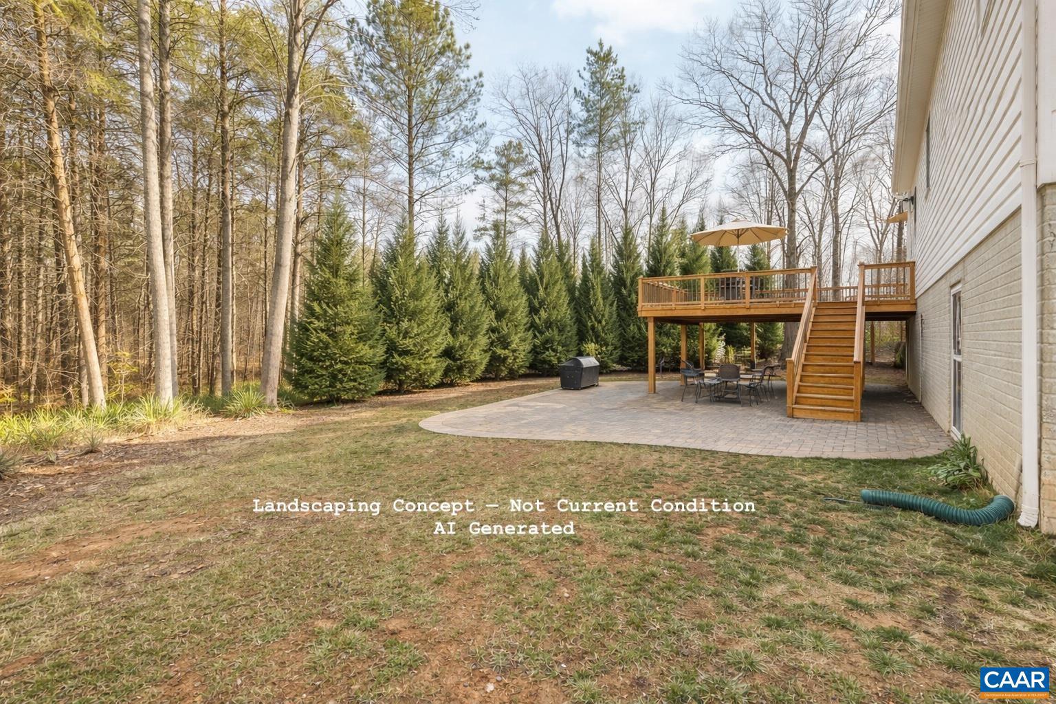 1229 Peach Grove Road Louisa, VA 23093 - Photo 43 of 46 a view of a house with backyard and sitting area