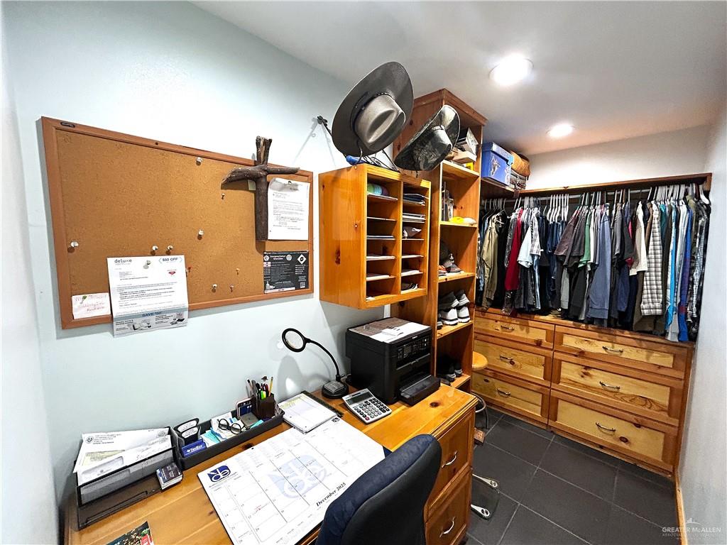 5101 Mile 8 Road Edinburg, TX 78541 - Photo 10 of 18 a bed room with furniture and a window