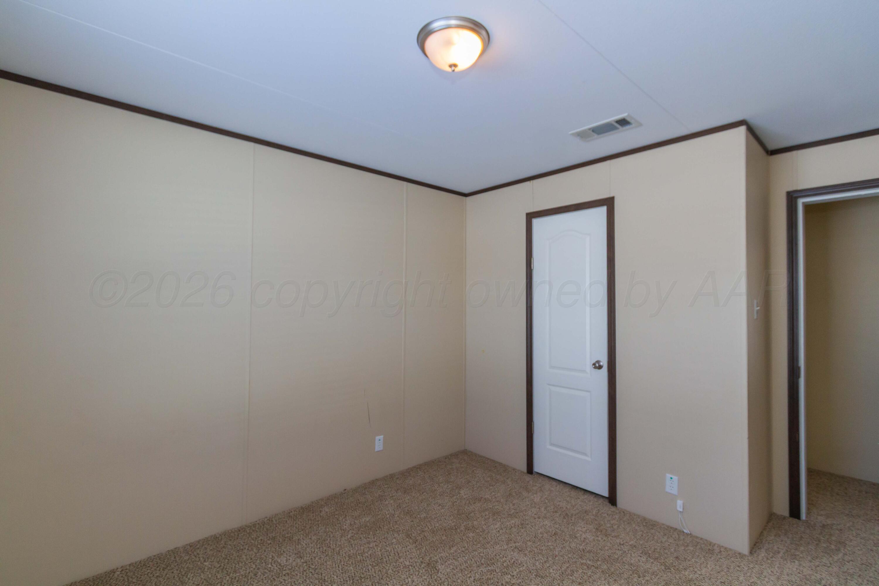 108 North Canadian Street Wheeler, TX 79096 - Photo 31 of 42 a view of a livingroom with a refrigerator
