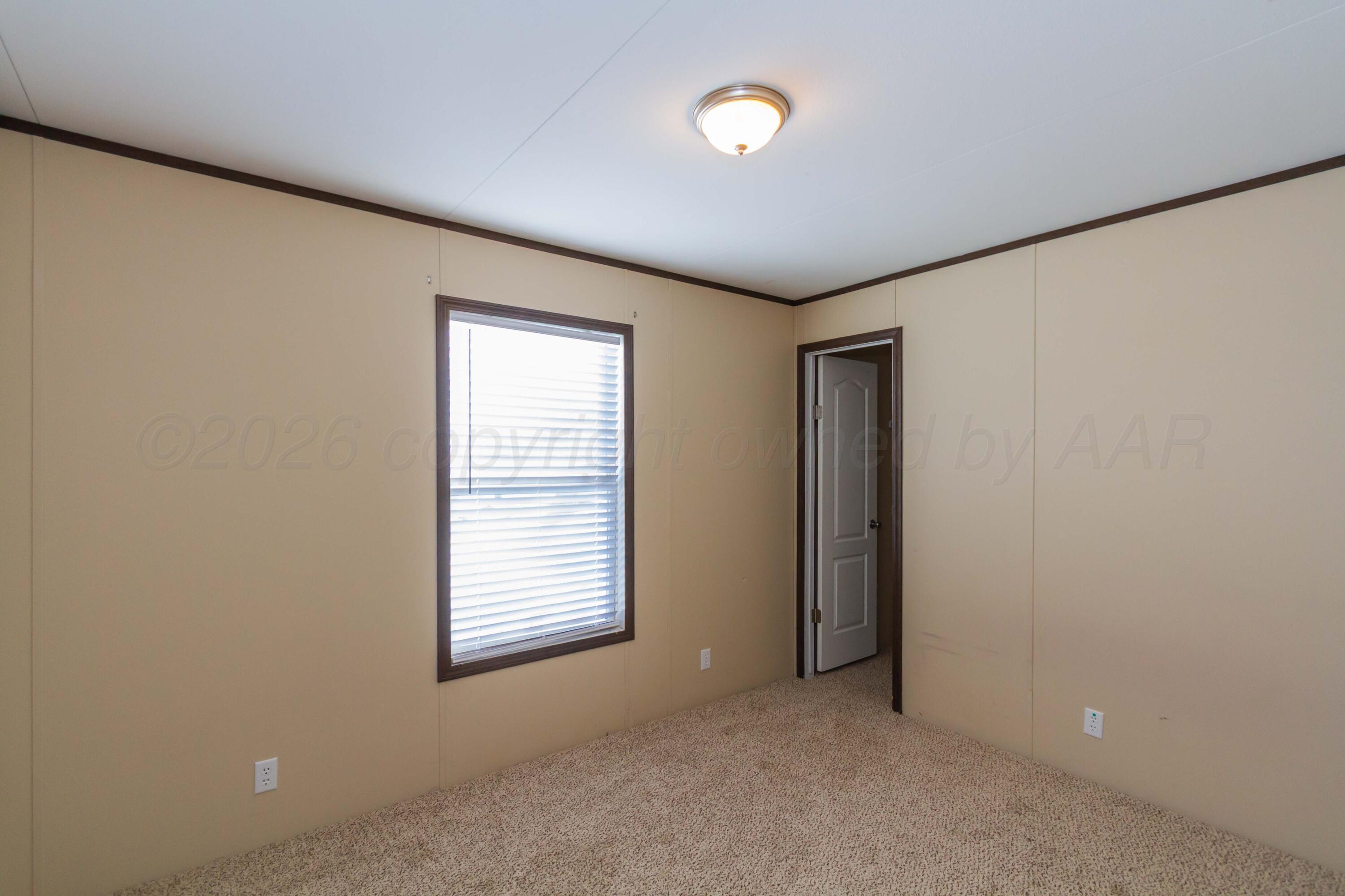 108 North Canadian Street Wheeler, TX 79096 - Photo 34 of 42 an empty room with windows