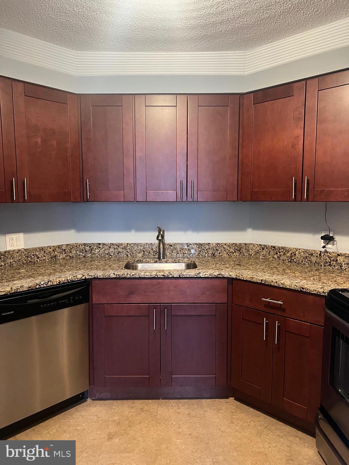 2020 Walnut Street, Unit 6C Philadelphia, PA 19103 - Photo 7 of 25 a kitchen with a sink and cabinets