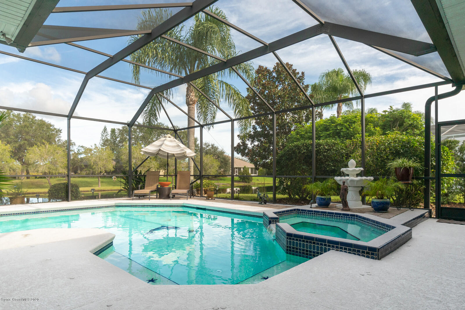 4050 Stoney Point Road Melbourne, FL 32940 - Photo 3 of 52 a house view with a sitting space and sitting space