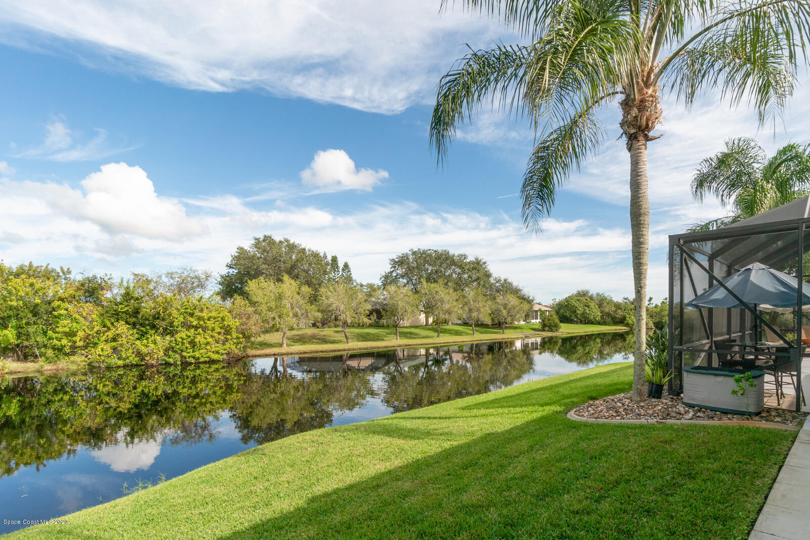 4050 Stoney Point Road Melbourne, FL 32940 - Photo 4 of 52 a view of a lake with a big yard