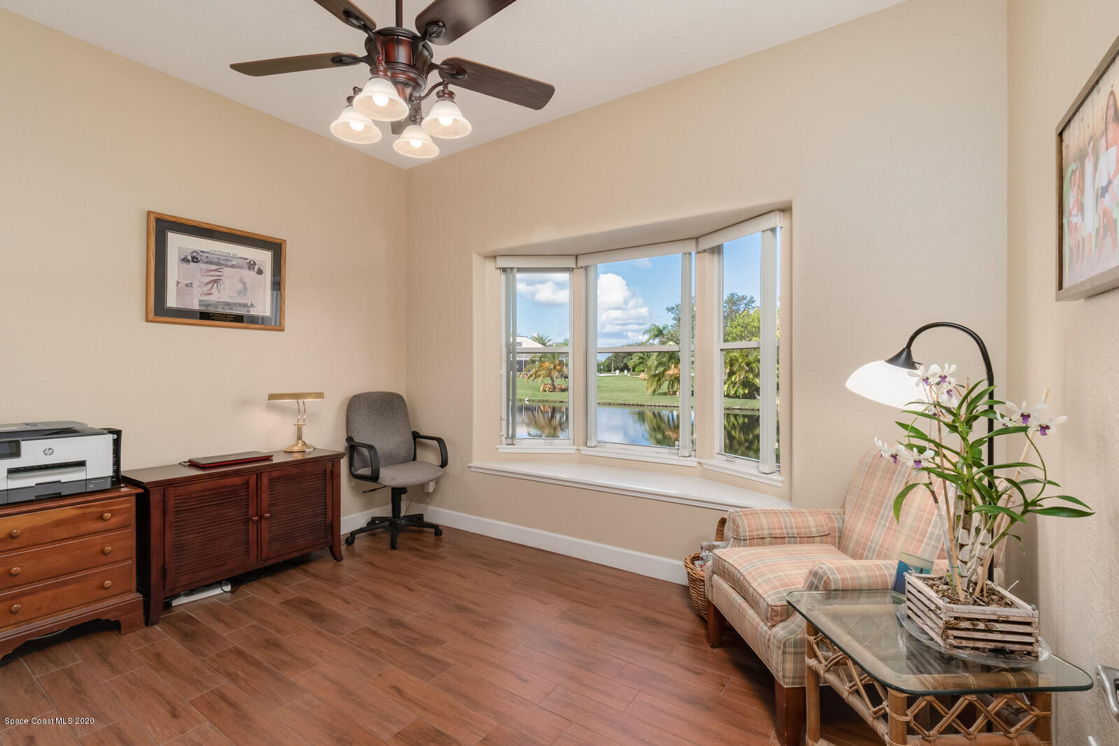 4050 Stoney Point Road Melbourne, FL 32940 - Photo 34 of 52 a view of a workspace with furniture and a window