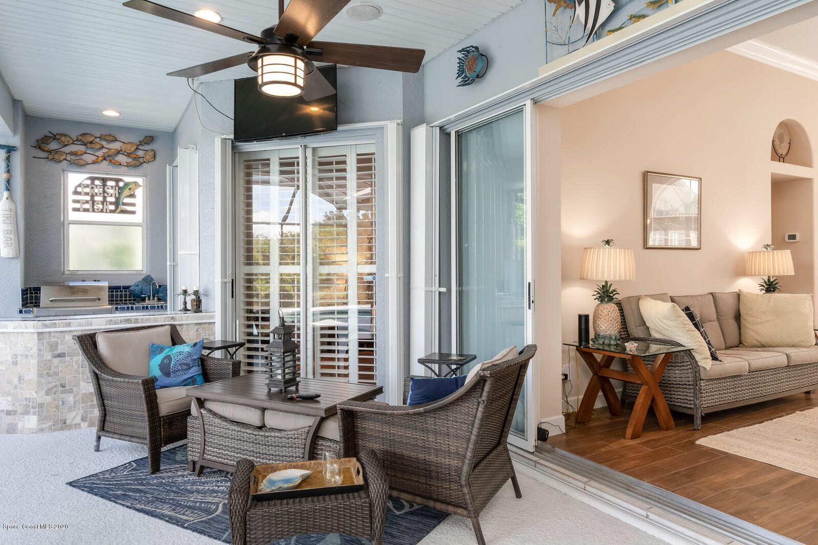 4050 Stoney Point Road Melbourne, FL 32940 - Photo 38 of 52 a living room with furniture and a large window