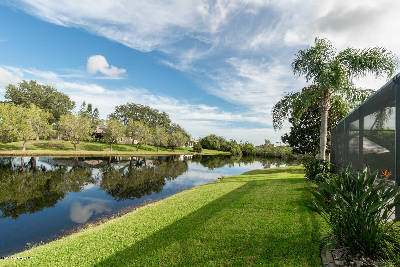 4050 Stoney Point Road Melbourne, FL 32940 - Photo 44 of 52 a view of a lake from a yard