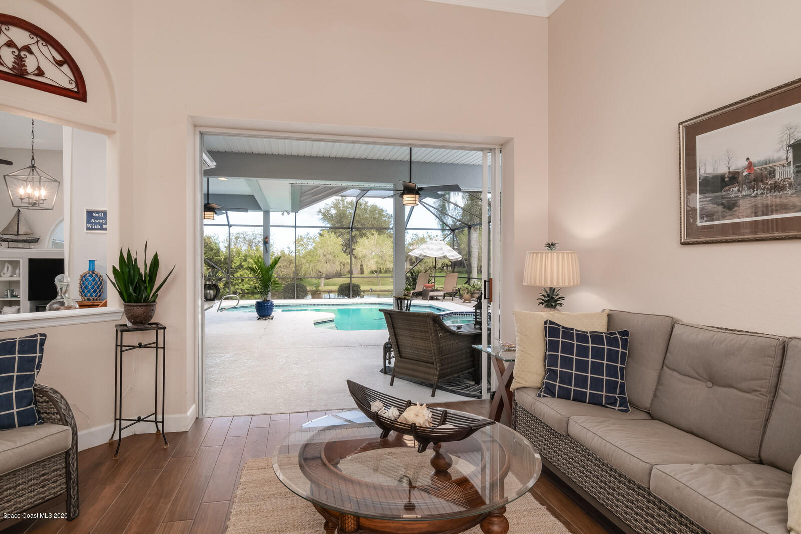 4050 Stoney Point Road Melbourne, FL 32940 - Photo 10 of 52 a living room with furniture and a large window