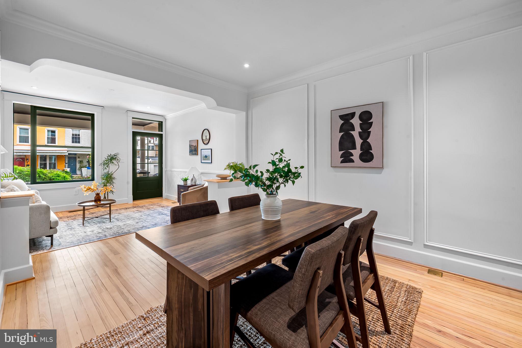 832 Union Avenue Baltimore, MD 21211 - Photo 12 of 43 a view of a dining room with furniture and wooden floor