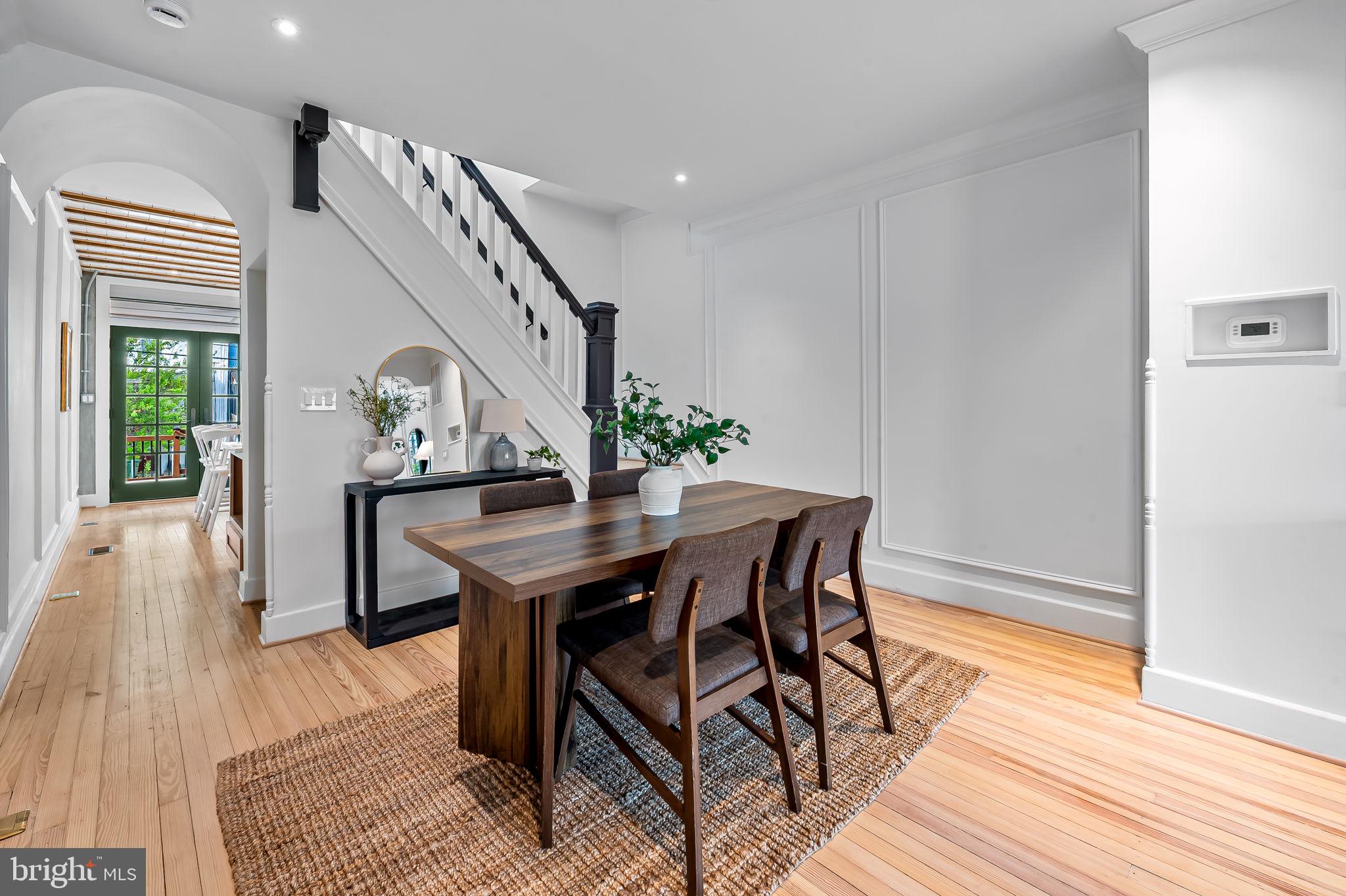832 Union Avenue Baltimore, MD 21211 - Photo 13 of 43 a view of a dining room with furniture and wooden floor