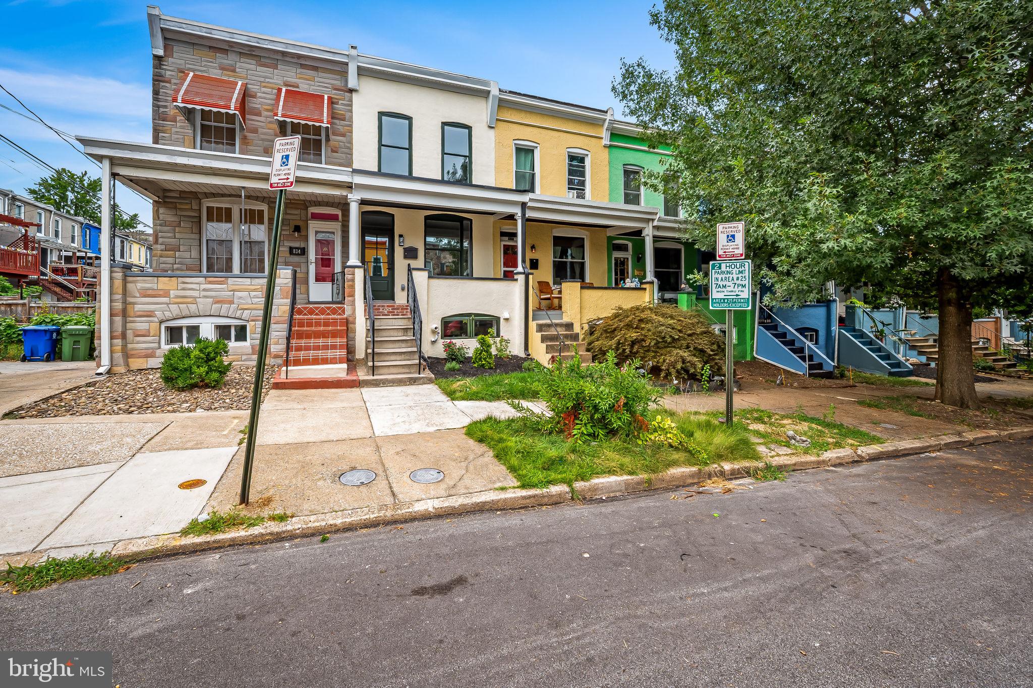 832 Union Avenue Baltimore, MD 21211 - Photo 2 of 43 a front view of a house with garden