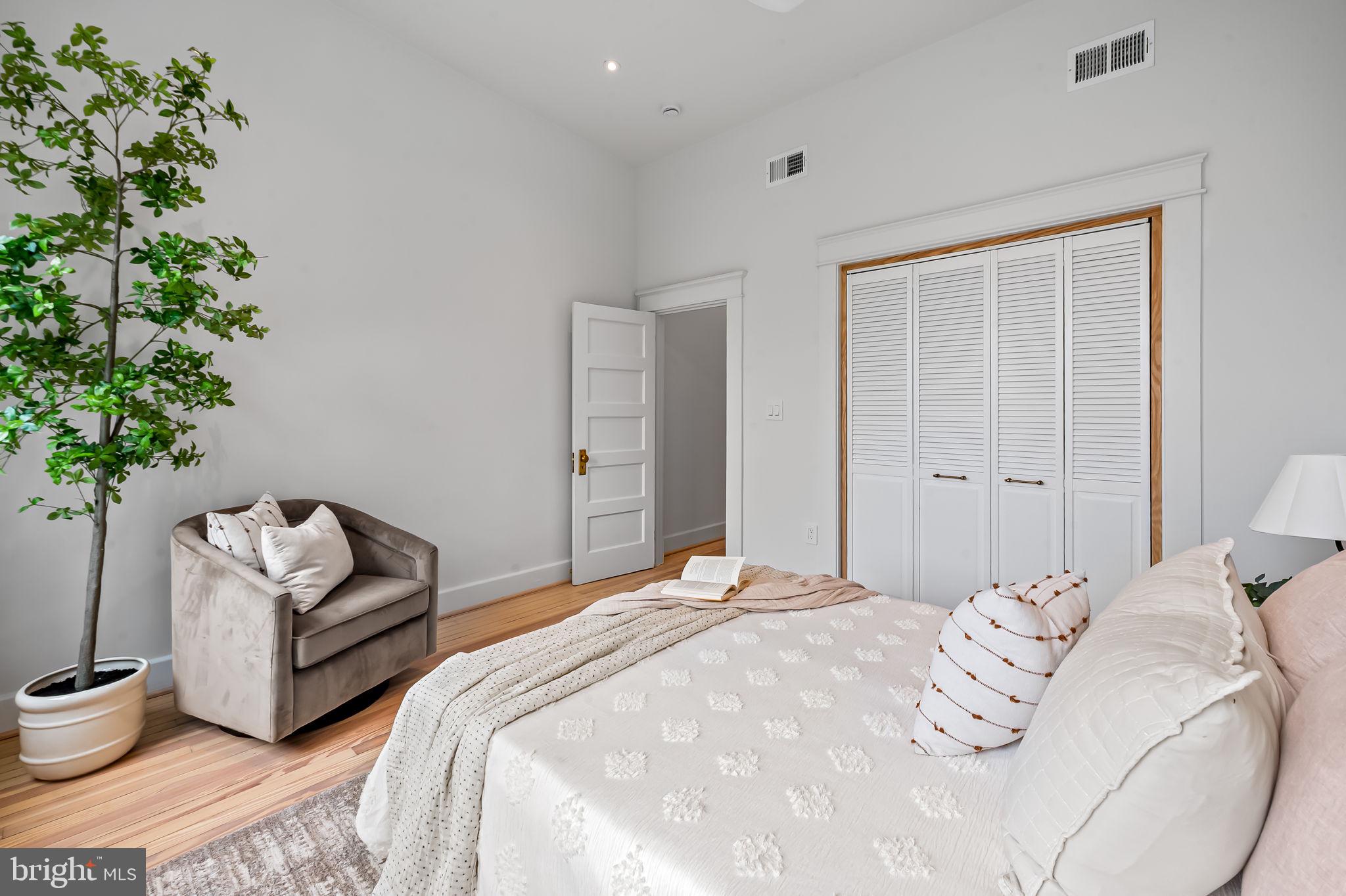 832 Union Avenue Baltimore, MD 21211 - Photo 23 of 43 a bedroom with a bed and a couch