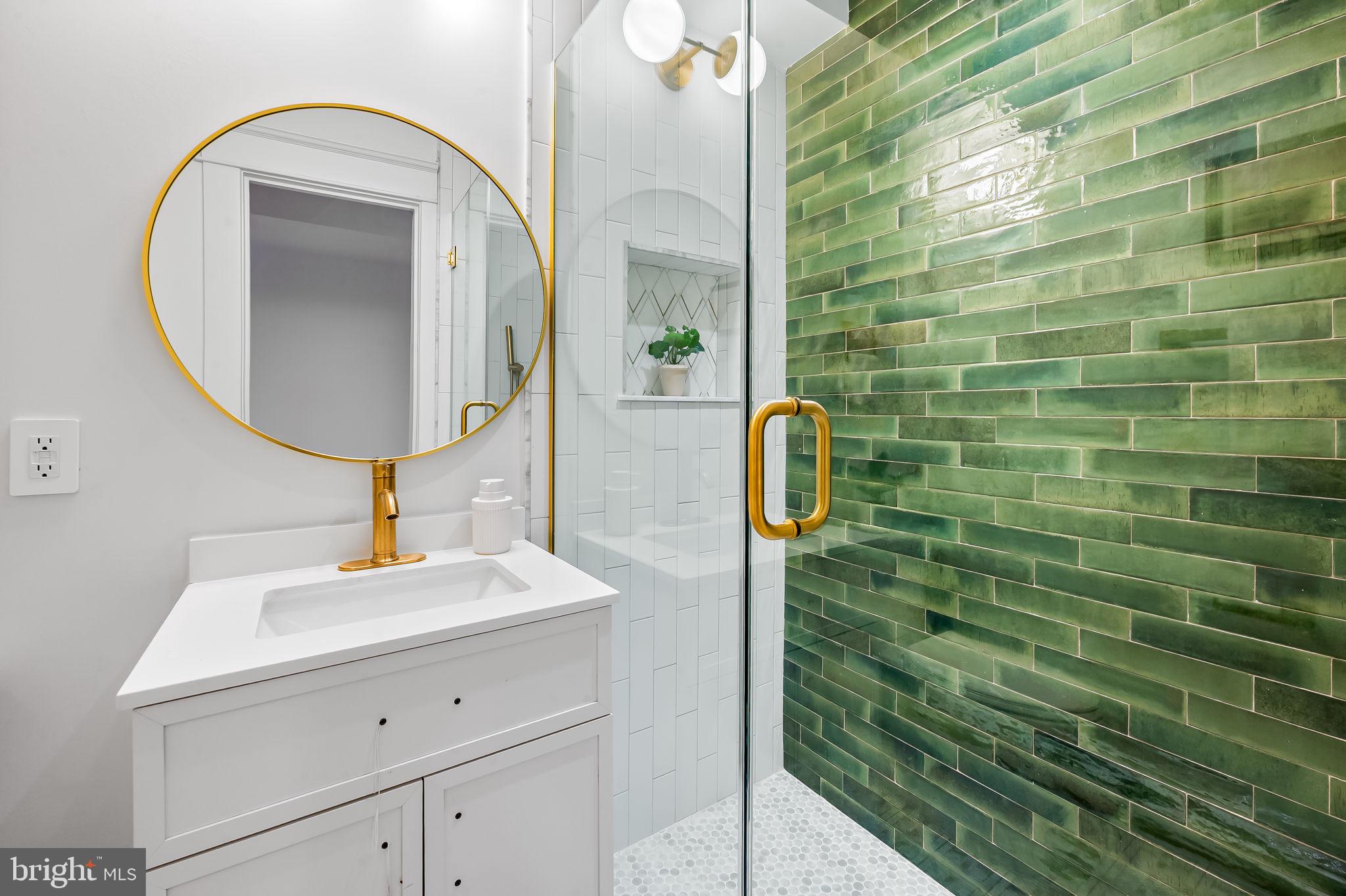 832 Union Avenue Baltimore, MD 21211 - Photo 36 of 43 a bathroom with a sink and mirror