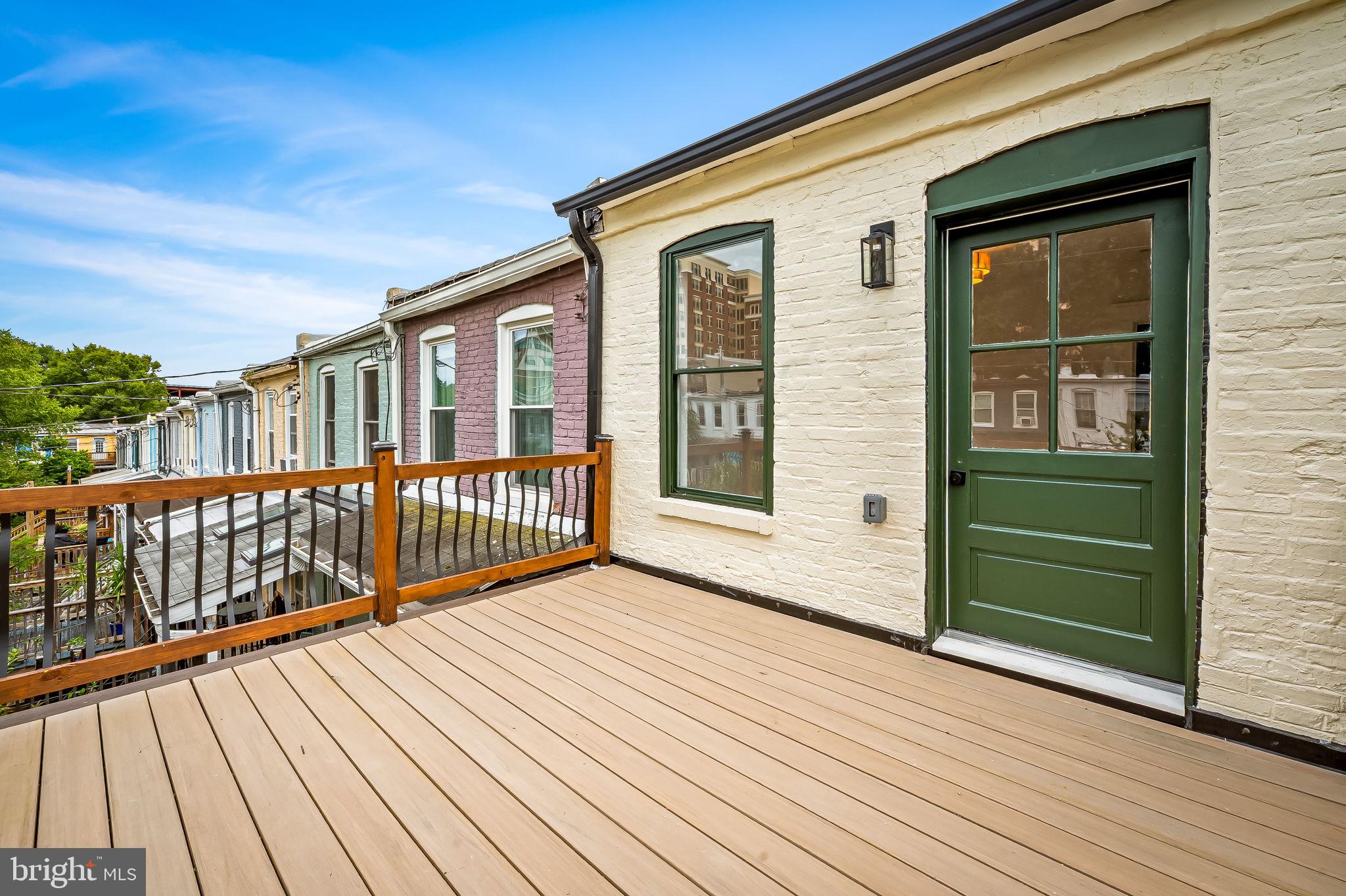 832 Union Avenue Baltimore, MD 21211 - Photo 38 of 43 a view of a house with wooden deck