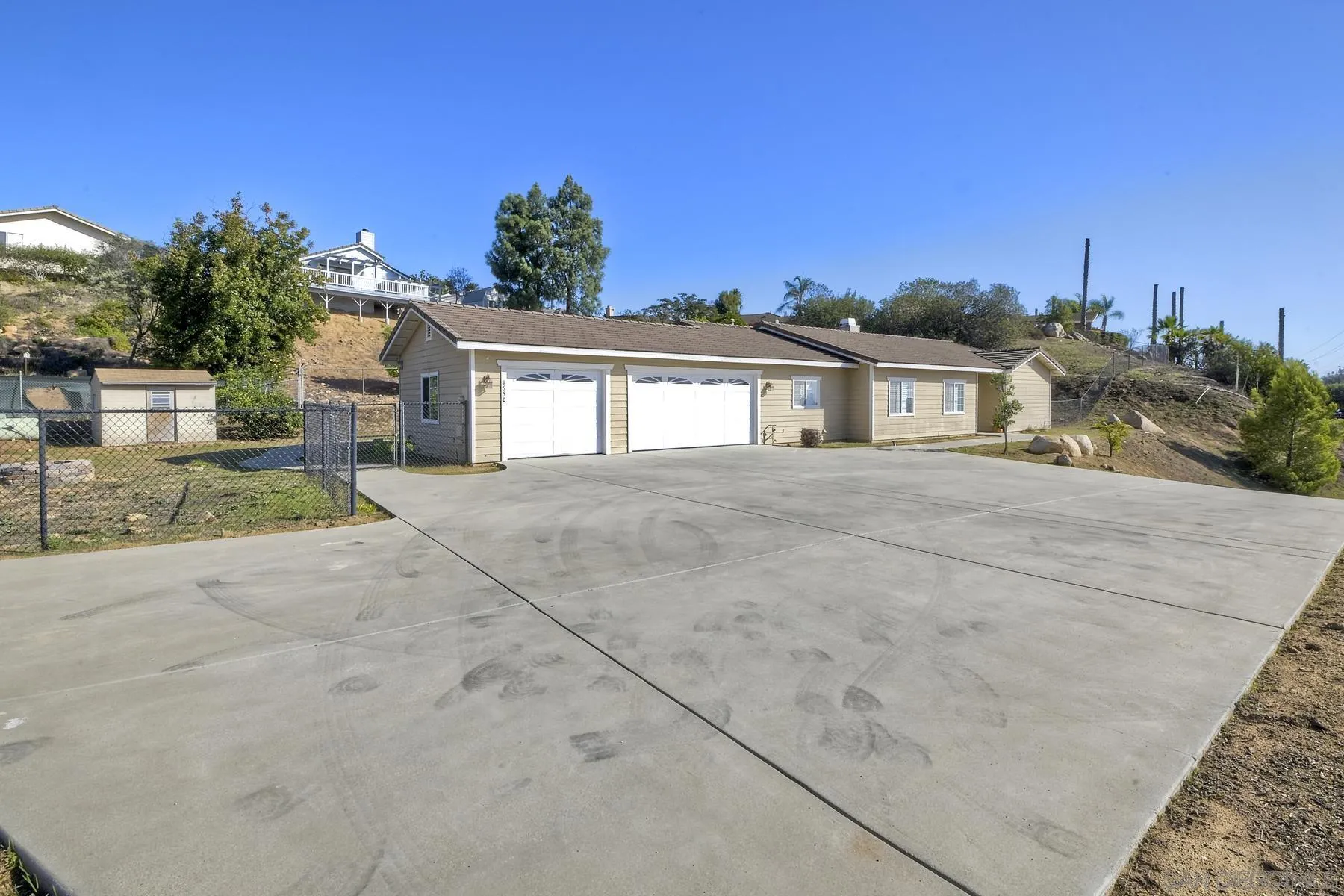 1550 Alturas Road Fallbrook, CA 92028 - Photo 2 of 31 front view of house with a yard