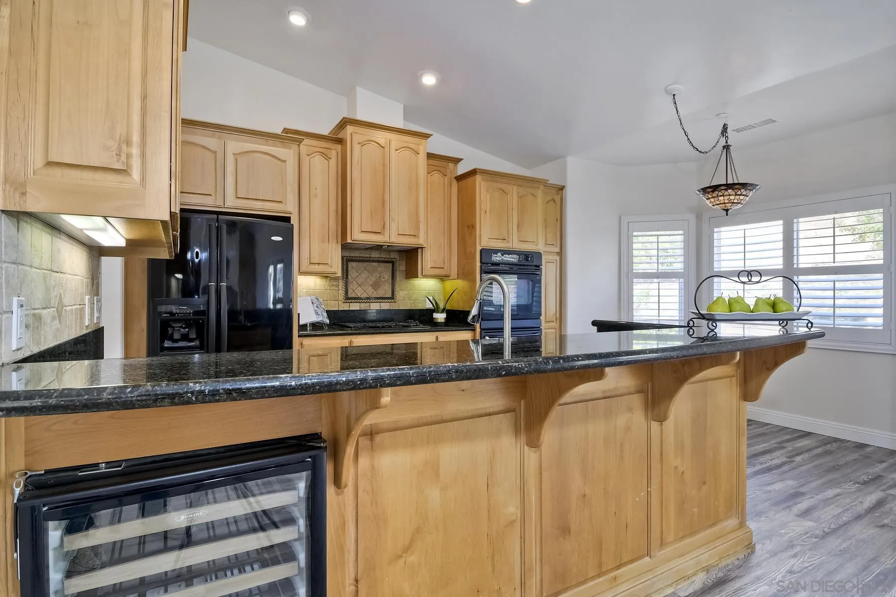 1550 Alturas Road Fallbrook, CA 92028 - Photo 7 of 31 a kitchen with stainless steel appliances granite countertop a stove a sink and a microwave