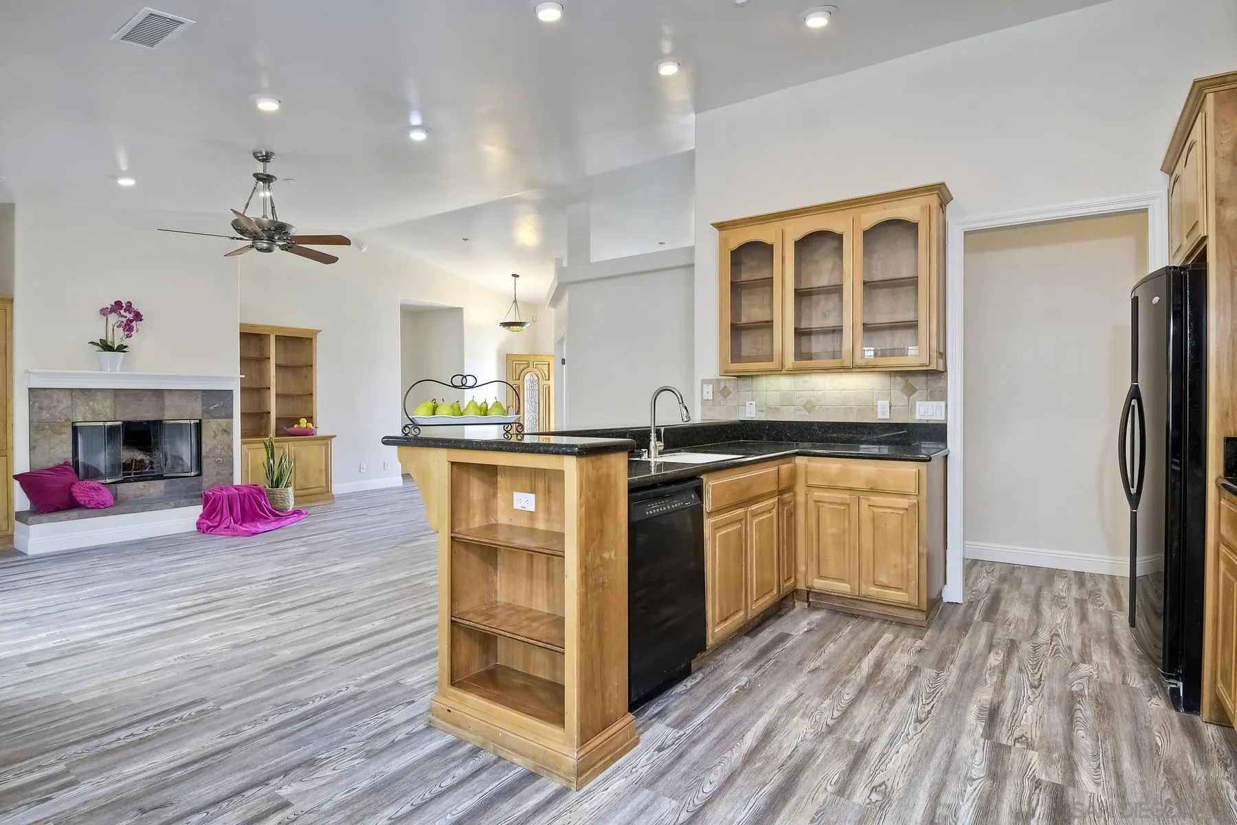 1550 Alturas Road Fallbrook, CA 92028 - Photo 9 of 31 a kitchen with stainless steel appliances granite countertop a stove and a refrigerator