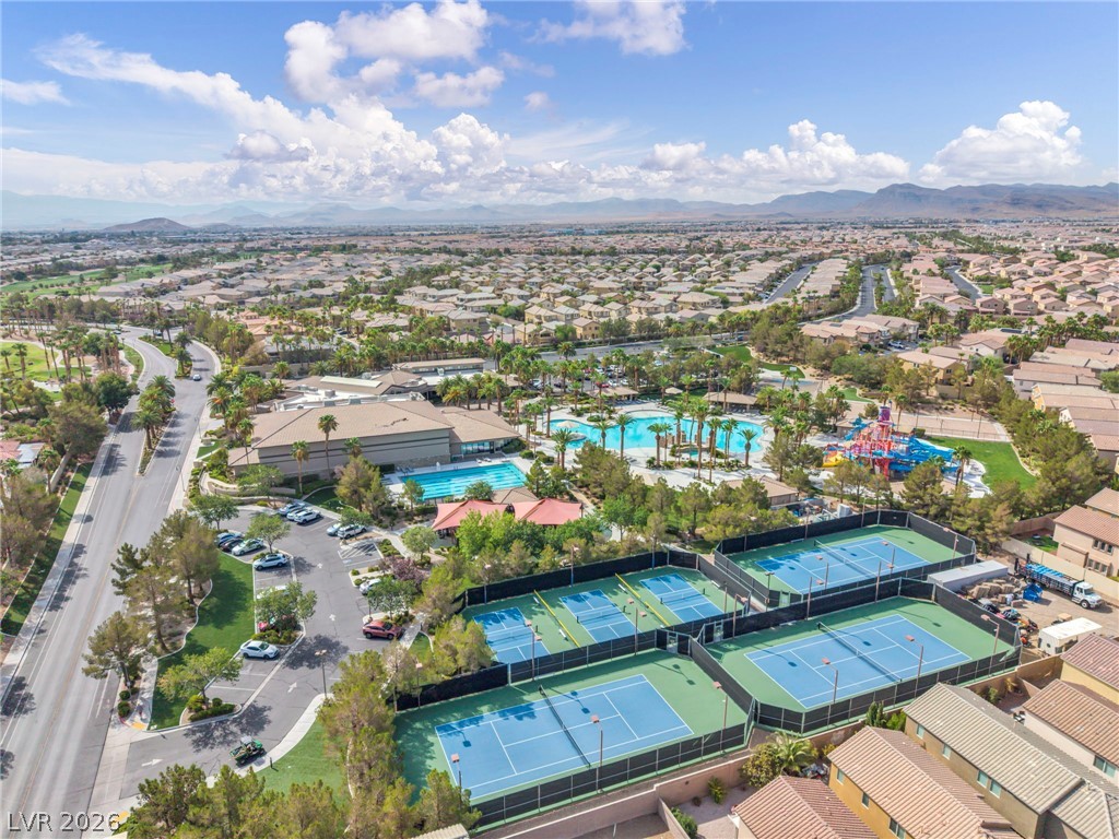 389 Fringe Ruff Drive Las Vegas, NV 89148 - Photo 48 of 53 A vibrant master-planned community unfolds with resort-style swimming pools and multiple sports courts.