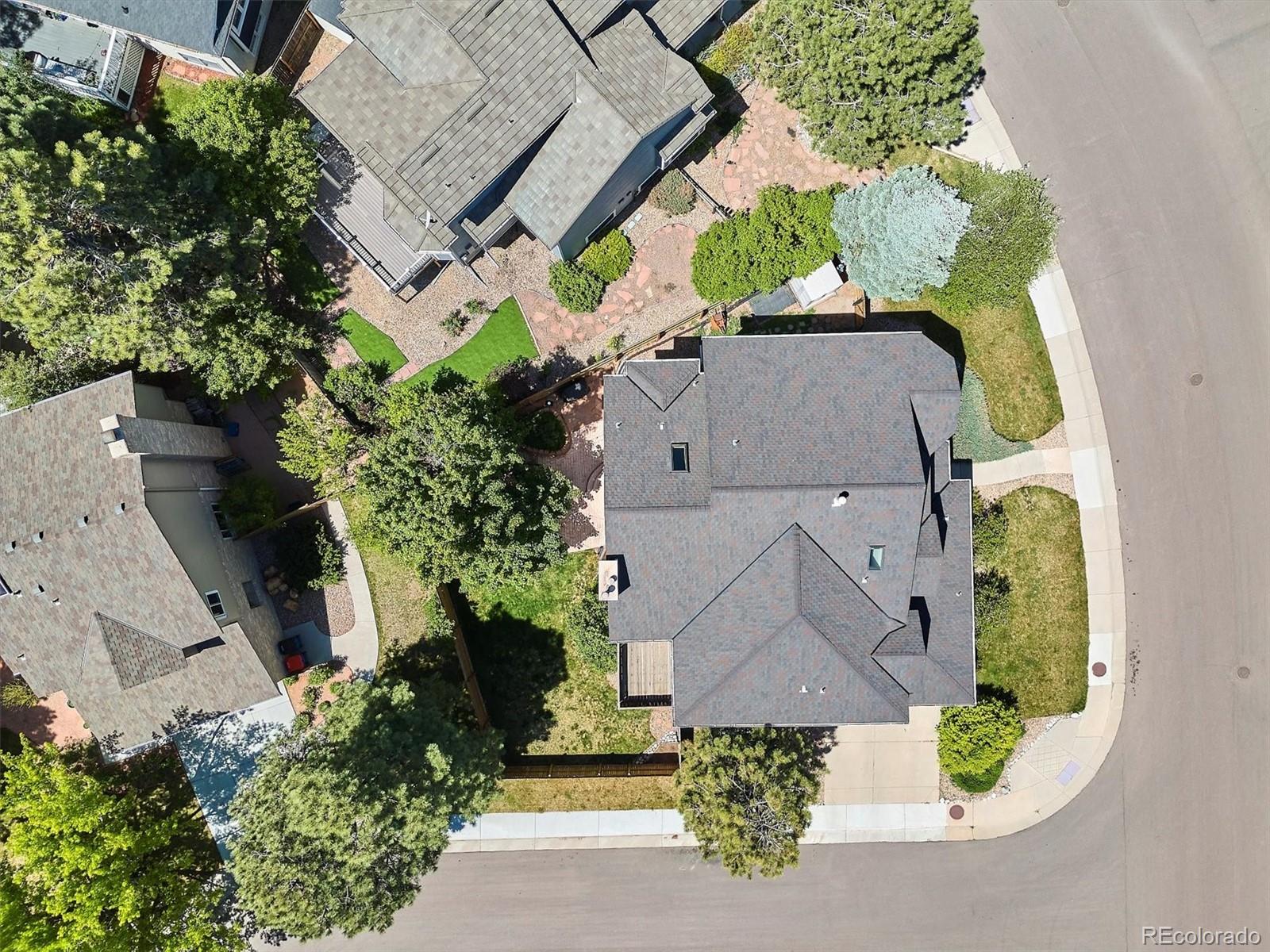 7804 Silverweed Way Lone Tree, CO 80124 - Photo 29 of 32 an aerial view of a house with a garden