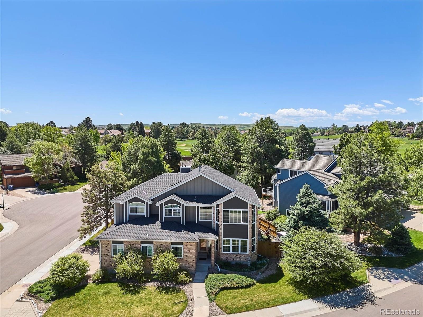 7804 Silverweed Way Lone Tree, CO 80124 - Photo 30 of 32 an aerial view of a house with a big yard