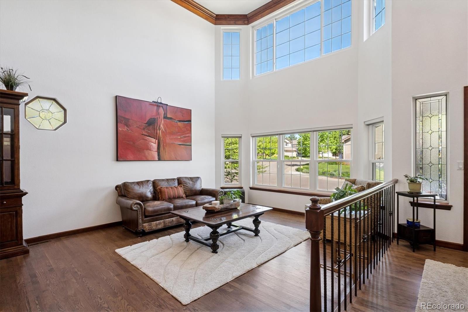 7804 Silverweed Way Lone Tree, CO 80124 - Photo 9 of 32 a living room with furniture and a large window