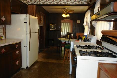 10851 Oak Avenue Chicago Ridge, IL 60415 - Photo 5 of 15 a kitchen with a refrigerator and a stove