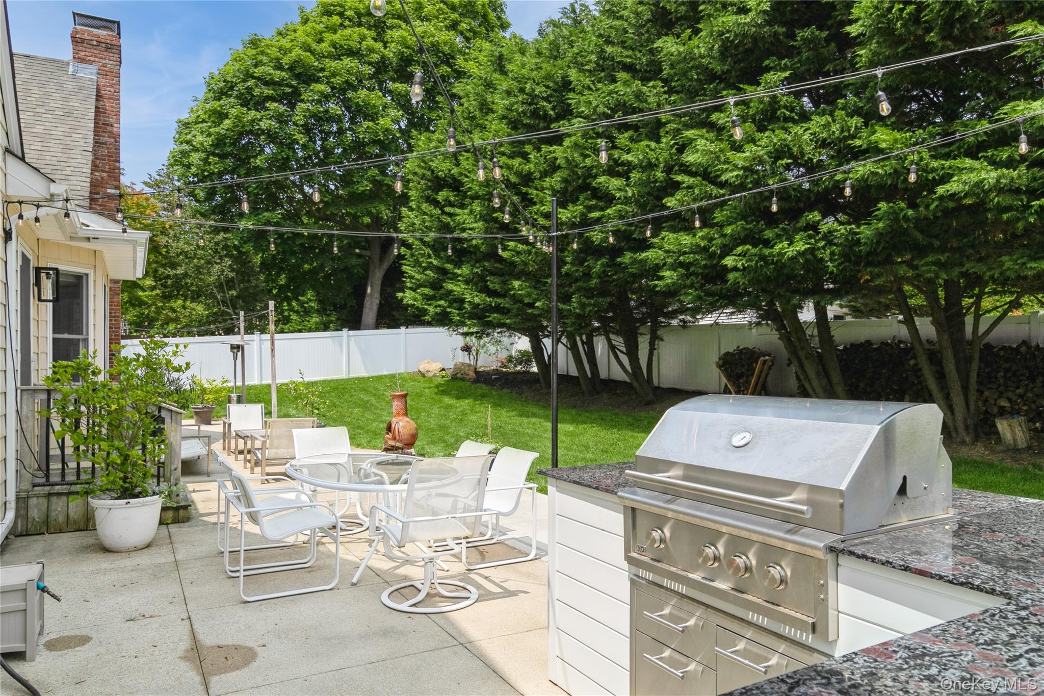 800 Ruth Road Mattituck, NY 11952 - Photo 24 of 29 a view of a patio with chairs and table