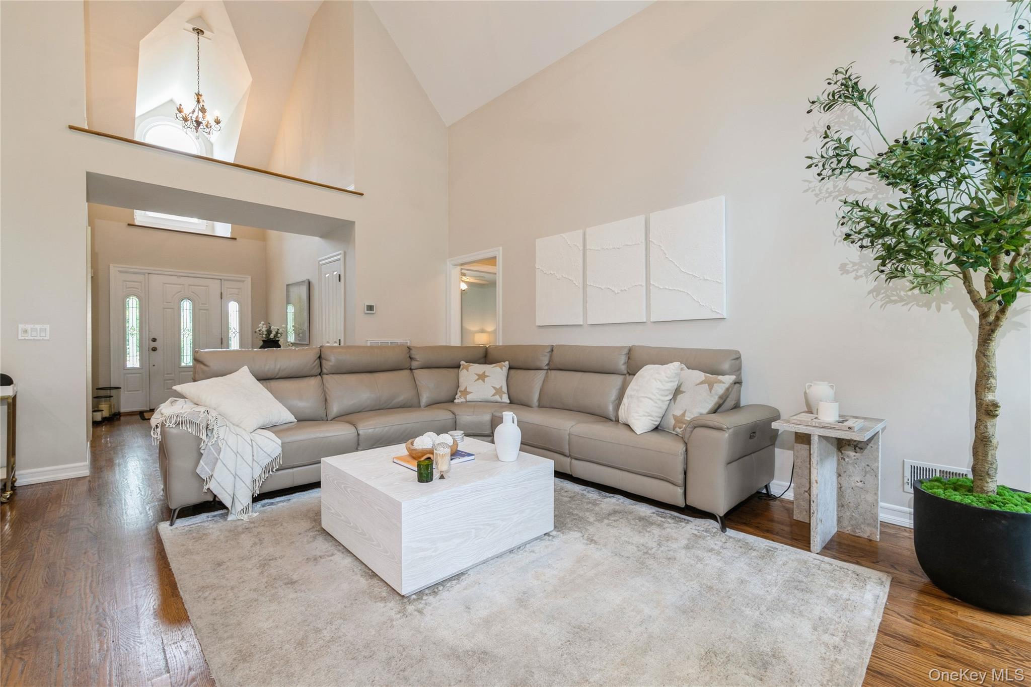 800 Ruth Road Mattituck, NY 11952 - Photo 5 of 29 a living room with furniture and a potted plant